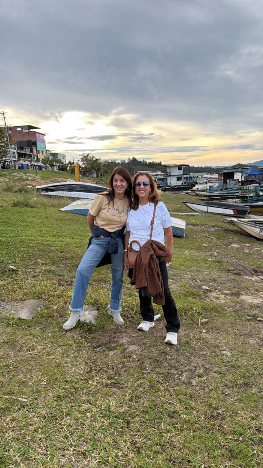 Two people in Guatapé's waterfront district
